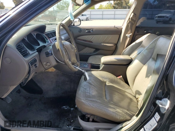 2002 Acura RL с VIN JH4KA96592C001872, выставлен на аукционе Copart как лот 55144775 с пробегом Не указан миль и Списание • Salvage title. История ставок и продаж доступна на DreamBid. Изображение 7.