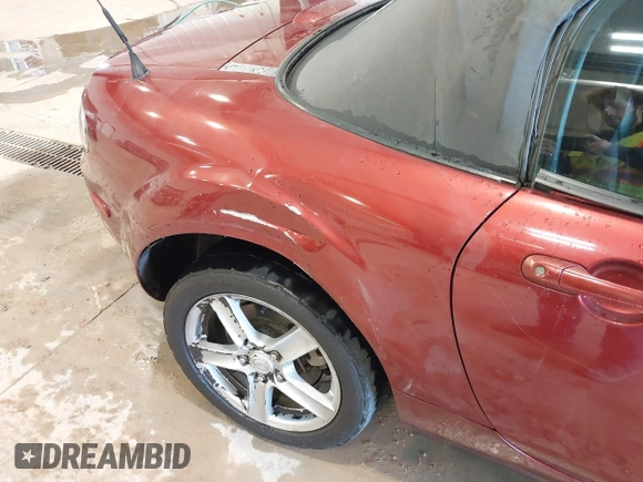 2007 Mazda MX-5 Miata Sport z VIN JM1NC25F970132299, wystawiony jako IAAI lot #41622791 z przebiegiem 72 392 mil mil oraz . Historia ofert i sprzedaży dostępna na DreamBid. Obrazek 6.