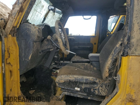 2009 Jeep Wrangler X with VIN 1J4FA24119L754391, listed as a Copart auction lot 56067805 with 118,117 mi miles and Salvage title. Bid and sale history available at DreamBid. Image 7.