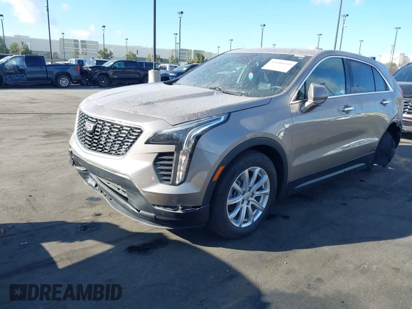 2023 Cadillac XT4 FWD Luxury z VIN 1GYAZAR40PF135132, wystawiony jako IAAI lot #41684609 z przebiegiem 12 164 mil mil oraz . Historia ofert i sprzedaży dostępna na DreamBid. Obrazek 6.