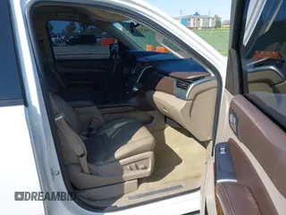 2015 Chevrolet Tahoe LT with VIN 1GNSCBKCXFR552071, listed as a IAAI auction lot 41972157 with 214,738 mi miles and . Bid and sale history available at DreamBid. Image 5.