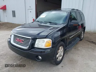 2002 GMC Envoy SLT with VIN 1GKDT13S622506181, listed as a IAAI auction lot 41986061 with 212,583 mi miles. Bid and sale history available at carsss.com. Image 2.