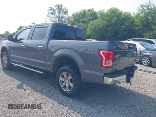 2015 Ford F-150 XLT with VIN 1FTEW1EG1FFB89473, listed as a IAAI auction lot 42590072 with 142,614 mi miles and . Bid and sale history available at DreamBid. Image 3.