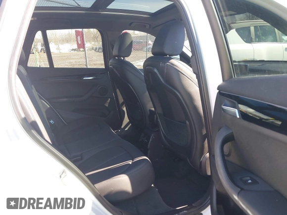 2019 BMW X1 xDrive28i with VIN WBXHT3C58K5N05523, listed as a IAAI auction lot 41752675 with 63,861 mi miles. Bid and sale history available at carsss.com. Image 8.