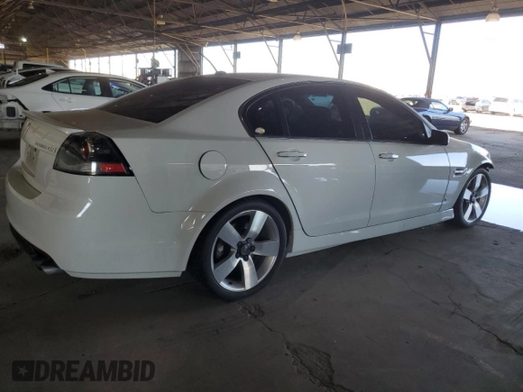 2009 Pontiac G8 GT with VIN 6G2EC57Y09L214446, listed as a Copart auction lot 77971444 with 82,552 mi miles and Salvage Title. Bid and sale history available at carsss.com. Image 3.