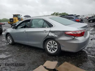 2015 Toyota Camry XLE z VIN 4T4BF1FK7FR460099, wystawiony jako Copart lot #57674195 z przebiegiem 162 774 mil mil oraz Szkoda całkowita • Salvage title. Historia ofert i sprzedaży dostępna na DreamBid. Obrazek 2.