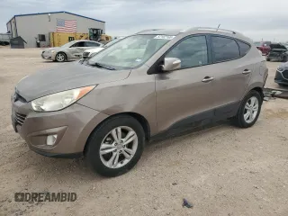 2013 Hyundai Tucson GLS with VIN KM8JU3AC5DU689630, listed as a Copart auction lot 52182165 with 69,038 mi miles and Salvage Title. Bid and sale history available at carsss.com. Image 1.