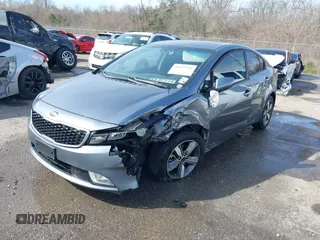 2018 Kia Forte LX with VIN 3KPFL4A79JE194864, listed as a IAAI auction lot 41657793 with 128,256 mi miles and . Bid and sale history available at DreamBid. Image 2.