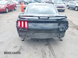 2016 Ford Mustang V6 z VIN 1FA6P8AM8G5251387, wystawiony jako IAAI lot #42231334 z przebiegiem 104 618 mil mil oraz . Historia ofert i sprzedaży dostępna na DreamBid. Obrazek 6.