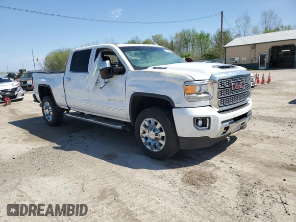 2019 GMC Sierra 2500HD Denali z VIN 1GT12SEY2KF106040, wystawiony jako Copart lot #54123885 z przebiegiem 153 684 mil mil oraz Szkoda całkowita • Salvage title. Historia ofert i sprzedaży dostępna na DreamBid. Obrazek 4.