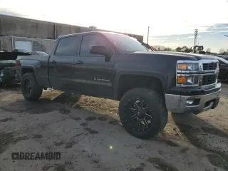 2015 Chevrolet Silverado 1500 LT with VIN 3GCUKREC9FG142578, listed as a Copart auction lot 44142905 with 194,369 mi miles and Salvage Title. Bid and sale history available at DreamBid. Image 4.