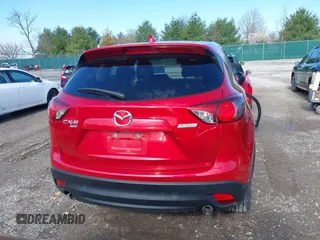 2016 Mazda CX-5 Touring with VIN JM3KE4CY5G0630438, listed as a IAAI auction lot 41877660 with 56,960 mi miles. Bid and sale history available at carsss.com. Image 17.
