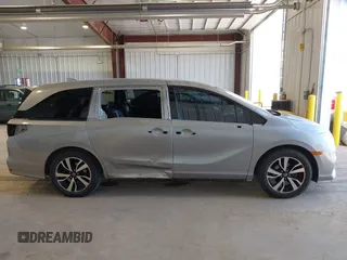 2018 Honda Odyssey Elite z VIN 5FNRL6H95JB105236, wystawiony jako IAAI lot #42020212 z przebiegiem 83 751 mil mil oraz . Historia ofert i sprzedaży dostępna na DreamBid. Obrazek 14.