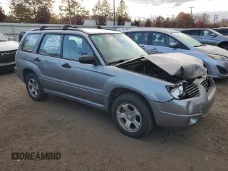 2007 Subaru Forester X with VIN JF1SG63617H746062, listed as a Copart auction lot 77686124 with 200,055 mi miles and Salvage Title. Bid and sale history available at carsss.com. Image 4.