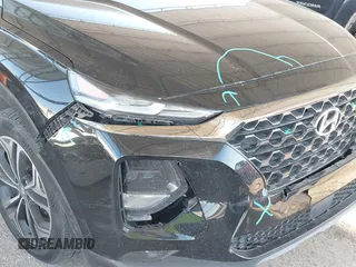 2019 Hyundai Santa Fe Ultimate with VIN 5NMS53AA3KH039879, listed as a IAAI auction lot 41223704 with 71,169 mi miles. Bid and sale history available at carsss.com. Image 6.