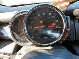 2014 MINI Hardtop S z VIN WMWXM7C54ET970410, wystawiony jako Copart lot #87269984 z przebiegiem 132 913 mil mil oraz Szkoda całkowita • Salvage title. Historia ofert i sprzedaży dostępna na DreamBid. Obrazek 9.