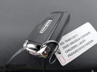 2020 Lincoln Corsair Standard z VIN 5LMCJ1C9XLUL01987, wystawiony jako IAAI lot #42044327 z przebiegiem 98 963 mil mil oraz . Historia ofert i sprzedaży dostępna na DreamBid. Obrazek 11.