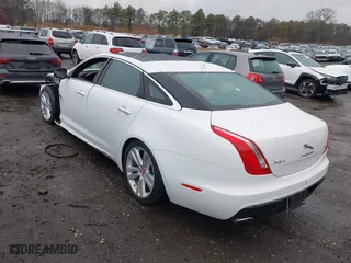 2017 Jaguar XJ with VIN SAJWA2G73H8W04310, listed as a IAAI auction lot 40914491 with 62,102 mi miles. Bid and sale history available at carsss.com. Image 3.