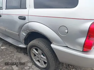 2006 Dodge Durango z VIN 1D4HD58266F123465, wystawiony jako IAAI lot #39442367 z przebiegiem 170 384 mil mil oraz . Historia ofert i sprzedaży dostępna na DreamBid. Obrazek 6.