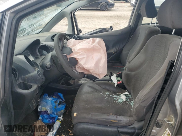 2009 Honda Fit with VIN JHMGE88249S025083, listed as a Copart auction lot 58121945 with Not provided miles and Salvage title. Bid and sale history available at DreamBid. Image 7.