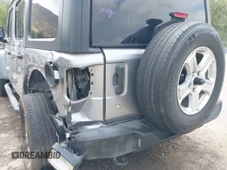 2018 Jeep Wrangler Unlimited Sport S with VIN 1C4HJXDN5JW145340, listed as a IAAI auction lot 42420695 with 92,500 mi miles and . Bid and sale history available at DreamBid. Image 6.