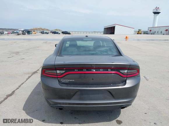 2020 Dodge Charger Police with VIN 2C3CDXKT3LH112023, listed as a IAAI auction lot 42124903 with 130,738 mi miles. Bid and sale history available at carsss.com. Image 16.