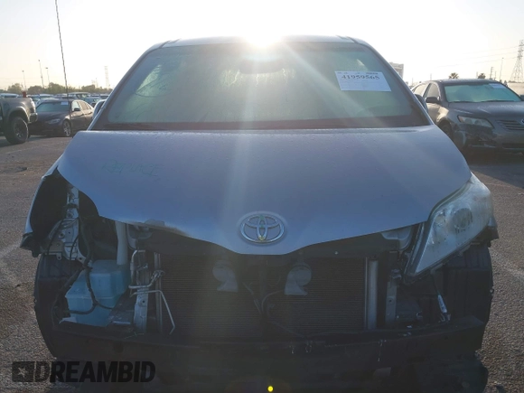 2014 Toyota Sienna LE AAS with VIN 5TDKK3DC1ES520561, listed as a IAAI auction lot 41959565 with 115,908 mi miles and . Bid and sale history available at carsss.com. Image 13.