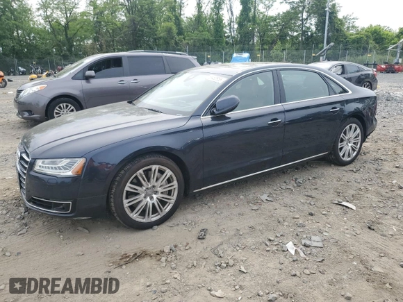 2016 Audi A8 3.0T with VIN WAU34AFD9GN009551, listed as a Copart auction lot 56460955 with 70,246 mi miles and Salvage title. Bid and sale history available at DreamBid. Image 1.
