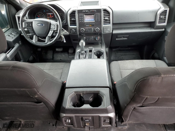 2015 Ford F-150 XLT w/HD Payload Pkg with VIN 1FTFW1EG9FFA35744, listed as a Copart auction lot 51133275 with 128,006 mi miles and Salvage Title. Bid and sale history available at carsss.com. Image 8.
