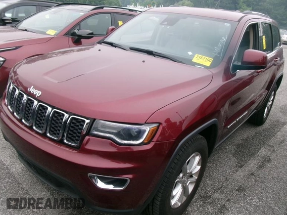 2021 Jeep Grand Cherokee Laredo X with VIN 1C4RJFAG3MC611583, listed as a IAAI auction lot 42631284 with 99,457 mi miles and . Bid and sale history available at DreamBid. Image 9.