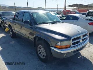 2004 Dodge Dakota SLT z VIN 1D7HL48K24S618072, wystawiony jako IAAI lot #42001943 z przebiegiem 202 449 mil mil oraz . Historia ofert i sprzedaży dostępna na DreamBid. Obrazek 1.