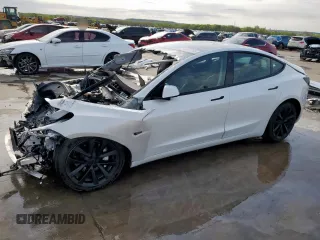2021 Tesla Model 3 Standard Range Plus z VIN 5YJ3E1EA2MF028623, wystawiony jako Copart lot #50602285 z przebiegiem Nie podano mil oraz Nie do naprawy • Non repairable. Historia ofert i sprzedaży dostępna na DreamBid. Obrazek 1.