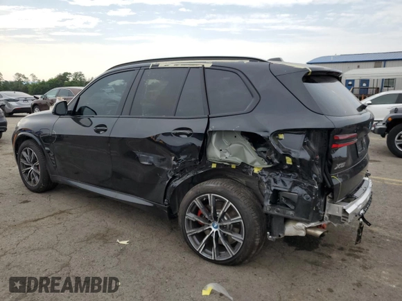 2024 BMW X5 xDrive50e with VIN 5UX43EU02R9U91727, listed as a Copart auction lot 64155574 with 7,050 mi miles and Salvage Title. Bid and sale history available at carsss.com. Image 2.
