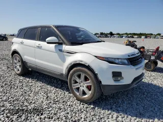 2014 Land Rover Range Rover Evoque Pure Plus with VIN SALVP2BGXEH931100, listed as a Copart auction lot 52293665 with 99,409 mi miles and Salvage title. Bid and sale history available at DreamBid. Image 4.