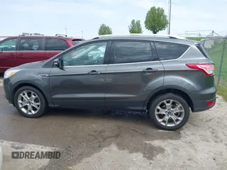 2015 Ford Escape Titanium with VIN 1FMCU0J90FUA25086, listed as a IAAI auction lot 41993681 with 126,170 mi miles. Bid and sale history available at carsss.com. Image 14.