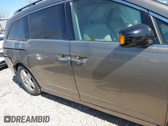 2012 Honda Odyssey Touring with VIN 5FNRL5H9XCB110672, listed as a IAAI auction lot 41826895 with 159,927 mi miles. Bid and sale history available at carsss.com. Image 13.