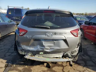 2015 Mazda CX-5 Touring with VIN JM3KE4CY5F0506569, listed as a Copart auction lot 49441035 with 160,077 mi miles and Salvage Title. Bid and sale history available at DreamBid. Image 6.
