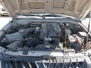 2001 Mitsubishi Montero ES z VIN JA4LS21HX1P041052, wystawiony jako IAAI lot #42084599 z przebiegiem 239 095 mil mil oraz . Historia ofert i sprzedaży dostępna na DreamBid. Obrazek 10.