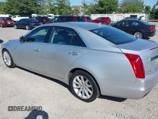 2014 Cadillac CTS Luxury AWD with VIN 1G6AX5S34E0124464, listed as a IAAI auction lot 42298607 with 89,351 mi miles and . Bid and sale history available at DreamBid. Image 3.