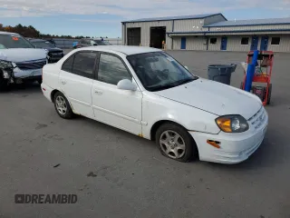 2005 Hyundai Accent GLS with VIN KMHCG45CX5U640554, listed as a Copart auction lot 77653664 with 179,642 mi miles and Clean Title. Bid and sale history available at carsss.com. Image 4.