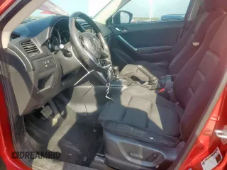 2014 Mazda CX-5 Touring with VIN JM3KE2CY1E0323298, listed as a Copart auction lot 50421685 with 214,739 mi miles and Salvage Title. Bid and sale history available at DreamBid. Image 7.