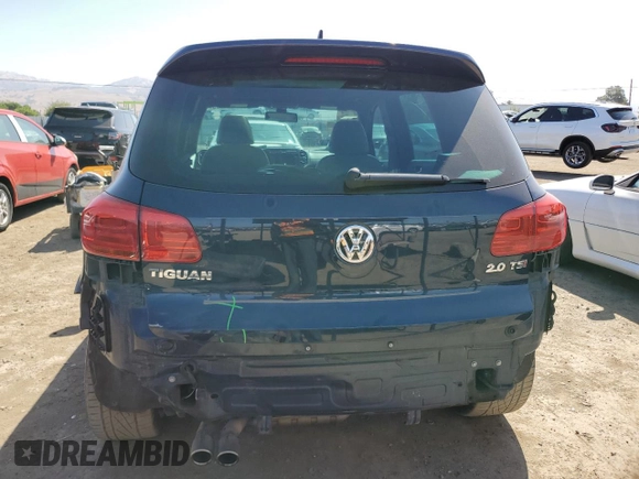 2015 Volkswagen Tiguan SE with VIN WVGAV7AX2FW094359, listed as a Copart auction lot 60101885 with 106,305 mi miles and Salvage title. Bid and sale history available at DreamBid. Image 6.