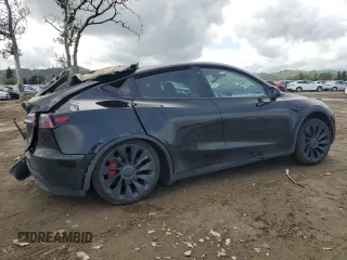 2022 Tesla Model Y Performance with VIN 7SAYGDEF1NF404133, listed as a Copart auction lot 51108165 with 44,102 mi miles and Salvage Title. Bid and sale history available at DreamBid. Image 3.