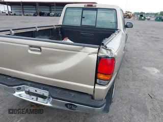 1997 Mazda B-Series Truck LE z VIN 4F4DR17X5VTM29258, wystawiony jako IAAI lot #42205942 z przebiegiem 271 473 mil mil oraz . Historia ofert i sprzedaży dostępna na DreamBid. Obrazek 6.