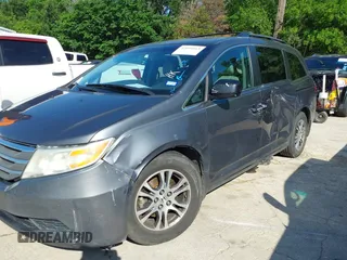 2011 Honda Odyssey EX-L with VIN 5FNRL5H6XBB073482, listed as a IAAI auction lot 42090463 with 213,061 mi miles and . Bid and sale history available at carsss.com. Image 6.