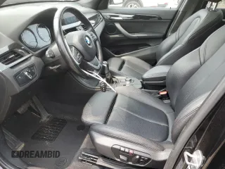 2018 BMW X1 xDrive28i with VIN WBXHT3C36J3H29952, listed as a Copart auction lot 59679285 with 75,220 mi miles and Salvage title. Bid and sale history available at DreamBid. Image 7.