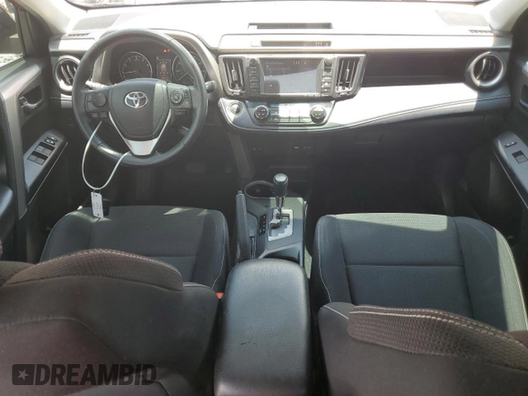 2018 Toyota RAV4 XLE with VIN 2T3WFREV7JW477541, listed as a Copart auction lot 64756575 with 59,779 mi miles and Salvage title. Bid and sale history available at DreamBid. Image 8.