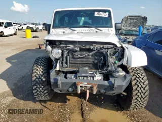 2017 Jeep Wrangler Unlimited Sahara with VIN 1C4HJWEG0HL585262, listed as a Copart auction lot 58748155 with 133,267 mi miles and Salvage title. Bid and sale history available at DreamBid. Image 5.