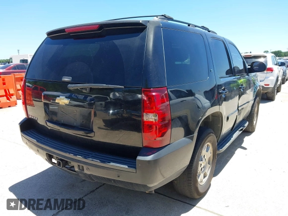 2007 Chevrolet Tahoe LS with VIN 1GNFC13J37R359934, listed as a IAAI auction lot 42306853 with 251,389 mi miles and . Bid and sale history available at DreamBid. Image 4.