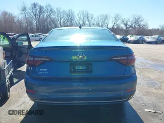 2021 Volkswagen Jetta S z VIN 3VWC57BU0MM009093, wystawiony jako IAAI lot #41643969 z przebiegiem 54 723 mil mil oraz . Historia ofert i sprzedaży dostępna na DreamBid. Obrazek 16.